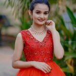 Meenakshi Anoop Instagram - RED❤️IT'S A COMMON FAVOURITE ❤️ Stylist and designer :@doms.2010 Photography:@fotographerjp Costume: @stitch_n_fit Jewellery:@anokhi_priyakishore Hair: @rathybaiju artistry Makeup: @arun_uthradam