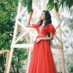 Meenakshi Anoop Instagram - Red is the trend 👀 Stylist and designer : @doms.2010 Costume: @annmaria_boutique Hair: @rathybaiju_mua jewellery: @anokhi_priyakishore Photography: @alan_psycoz