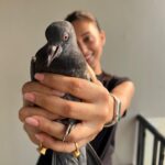Mimi Chakraborty Instagram - My little Peace angels grew so big. Had saved her/his mom(not sure) during a storm since than they stay in our balcony. They are so familiar with my touch that nvr try to fly away from me.Although now i visit this place very less but whenever i do they welcome me with the same love nd warmth. FYI: (They are free birds not caged )