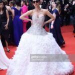 Mouni Roy Instagram - débutante 🕊️ On the Cannes red carpet tonight I have the loveliest people to thank for… Firstly my @trishilagoculdas for having my back come ruin or rapture. My @manekaharisinghani for being here with me constantly with me on rigorous video calls even without being here in person. Love love you. @thetyagiakshay you have shown me the kindness only the gods do. Merci @pankhuri313 @santu.misra for being the pillars here and leading the way. @shakeelbinafzal @wilsonballarin for being the sweetest kindest most patient 📸 buddies. ❤️ Georgi for the glam and for being the most graceful human being It was a dream debut and I shall remember every second of it. Taking many memories for days to come, also gonna be spamming your feeds incessantly x Dressed in:@atelierzuhra x Jewellery by @boucheron Heels:@giuseppezanotti Styled by : @manekaharisinghani with @chintan_shah08 HMU : gpkritikos Creative Production- @fetch_india @pankhurifetch Photographer - @wilsonballarin Videographer - @shakeelbinafzal Lenskart - @sashakeneivonuo @anupamtripathi_ #lenskartatcannes Cannes Film Festival