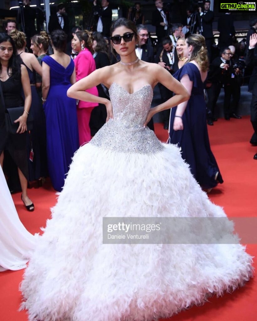 Mouni Roy Instagram - débutante 🕊️ On the Cannes red carpet tonight I have the loveliest people to thank for… Firstly my @trishilagoculdas for having my back come ruin or rapture. My @manekaharisinghani for being here with me constantly with me on rigorous video calls even without being here in person. Love love you. @thetyagiakshay you have shown me the kindness only the gods do. Merci @pankhuri313 @santu.misra for being the pillars here and leading the way. @shakeelbinafzal @wilsonballarin for being the sweetest kindest most patient 📸 buddies. ❤️ Georgi for the glam and for being the most graceful human being It was a dream debut and I shall remember every second of it. Taking many memories for days to come, also gonna be spamming your feeds incessantly x Dressed in:@atelierzuhra x Jewellery by @boucheron Heels:@giuseppezanotti Styled by : @manekaharisinghani with @chintan_shah08 HMU : gpkritikos Creative Production- @fetch_india @pankhurifetch Photographer - @wilsonballarin Videographer - @shakeelbinafzal Lenskart - @sashakeneivonuo @anupamtripathi_ #lenskartatcannes Cannes Film Festival