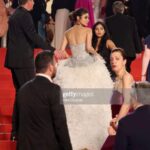 Mouni Roy Instagram - débutante 🕊️ On the Cannes red carpet tonight I have the loveliest people to thank for… Firstly my @trishilagoculdas for having my back come ruin or rapture. My @manekaharisinghani for being here with me constantly with me on rigorous video calls even without being here in person. Love love you. @thetyagiakshay you have shown me the kindness only the gods do. Merci @pankhuri313 @santu.misra for being the pillars here and leading the way. @shakeelbinafzal @wilsonballarin for being the sweetest kindest most patient 📸 buddies. ❤️ Georgi for the glam and for being the most graceful human being It was a dream debut and I shall remember every second of it. Taking many memories for days to come, also gonna be spamming your feeds incessantly x Dressed in:@atelierzuhra x Jewellery by @boucheron Heels:@giuseppezanotti Styled by : @manekaharisinghani with @chintan_shah08 HMU : gpkritikos Creative Production- @fetch_india @pankhurifetch Photographer - @wilsonballarin Videographer - @shakeelbinafzal Lenskart - @sashakeneivonuo @anupamtripathi_ #lenskartatcannes Cannes Film Festival