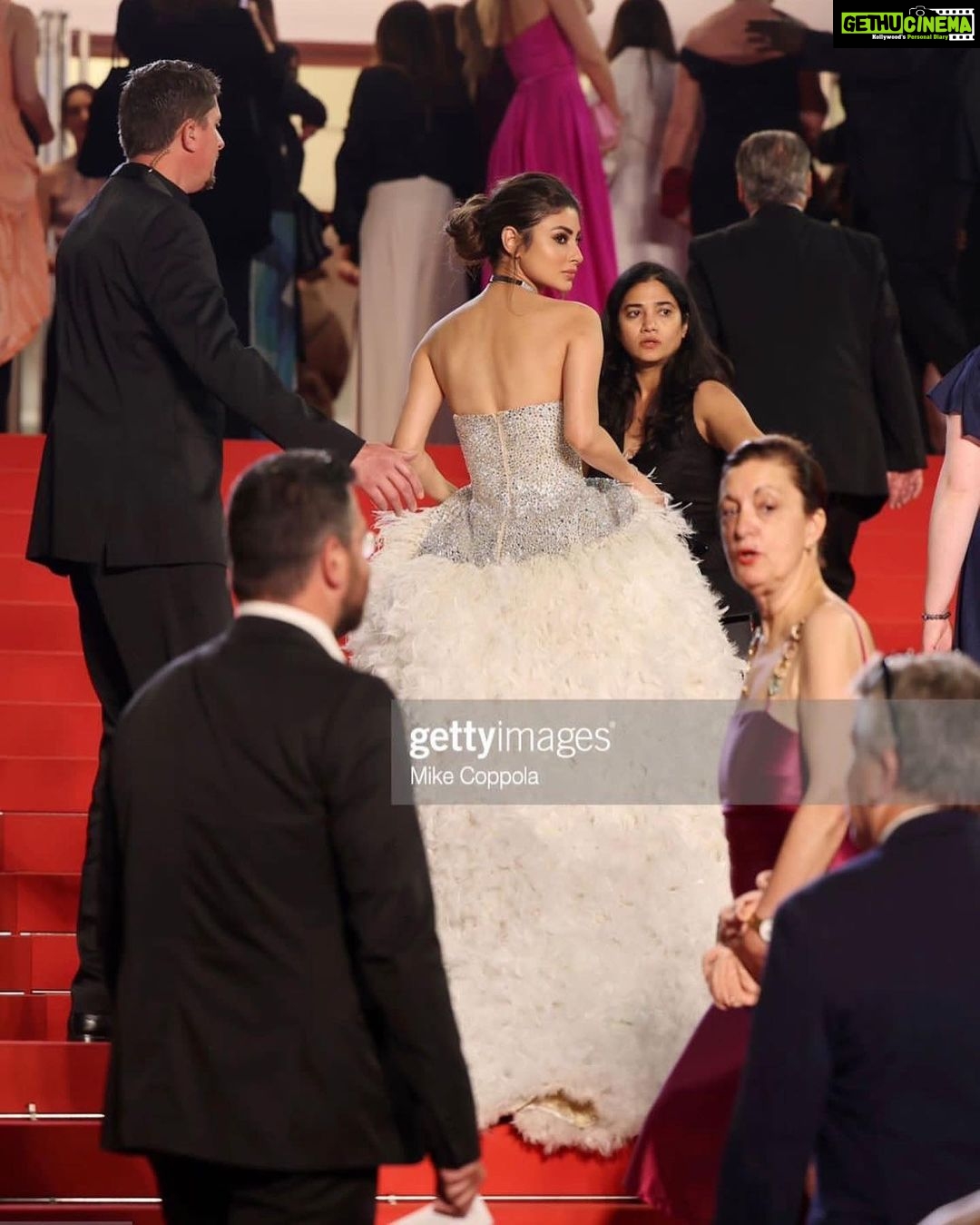 Mouni Roy Instagram - débutante 🕊️ On the Cannes red carpet tonight I have the loveliest people to thank for… Firstly my @trishilagoculdas for having my back come ruin or rapture. My @manekaharisinghani for being here with me constantly with me on rigorous video calls even without being here in person. Love love you. @thetyagiakshay you have shown me the kindness only the gods do. Merci @pankhuri313 @santu.misra for being the pillars here and leading the way. @shakeelbinafzal @wilsonballarin for being the sweetest kindest most patient 📸 buddies. ❤️ Georgi for the glam and for being the most graceful human being It was a dream debut and I shall remember every second of it. Taking many memories for days to come, also gonna be spamming your feeds incessantly x Dressed in:@atelierzuhra x Jewellery by @boucheron Heels:@giuseppezanotti Styled by : @manekaharisinghani with @chintan_shah08 HMU : gpkritikos Creative Production- @fetch_india @pankhurifetch Photographer - @wilsonballarin Videographer - @shakeelbinafzal Lenskart - @sashakeneivonuo @anupamtripathi_ #lenskartatcannes Cannes Film Festival