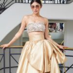 Mouni Roy Instagram – Life is a fairytale of courage, fear, failure, persistence and triumph. Dreams, desires, destiny, and difficulties in life make it a magical and meaningful journey. Living mine up at Cannes rn x 

Dressed in : @geyannayouness @theredcarpetshowroom
Cuffs: @pipabella x @rheakapoor by @nykaafashion 
Heels: @enricocuini
Styled by : @thetyagiakshay 
Beauty : gpkritikos

Creative Production- @fetch_india @pankhurifetch
Photographer – @wilsonballarin
Videographer – @shakeelbinafzal
Lenskart – @sashakeneivonuo
@anupamtripathi_
@lenskart 
#LenskartAtCannes 🤩 Cannes Film Festival
