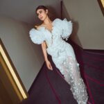 Mouni Roy Instagram - In the crucible of hardship's flame, the spirit ignites, fueled by an unwavering aim. Through the labyrinth of hustle, we navigate, chasing dreams, defying fate. And in the tapestry of life's grand design, we weave our story, where life truly shines….. Hustling err’yday 🤍 Styled by - @mohitrai with @shubhi.kumar @tarangagarwalofficial @teammrstyles Outfit - @michael5inco Shoes - @stevemaddenindia Beauty @bhavyaarora Managed by @trishilagoculdas @dcatalent 📸 @amannagoshe (happy happy birthday) 🎉 @iifa #iffa2023 Abu Dhabi, United Arab Emirates