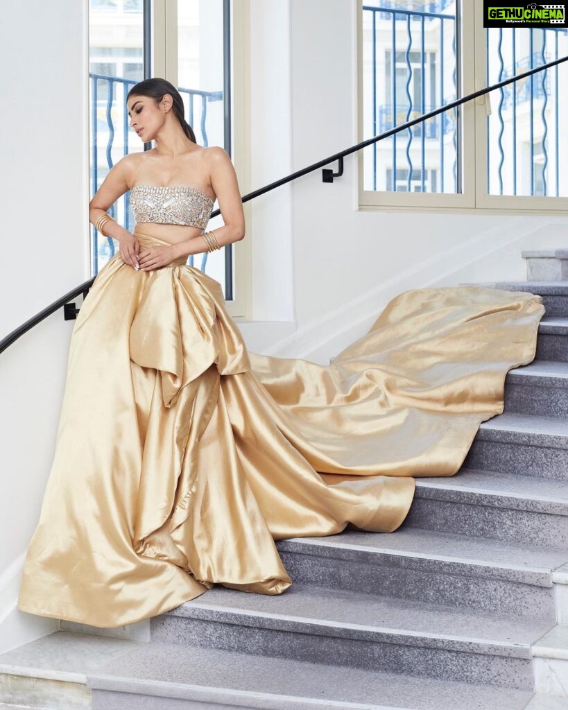 Mouni Roy Instagram - Life is a fairytale of courage, fear, failure, persistence and triumph. Dreams, desires, destiny, and difficulties in life make it a magical and meaningful journey. Living mine up at Cannes rn x Dressed in : @geyannayouness @theredcarpetshowroom Cuffs: @pipabella x @rheakapoor by @nykaafashion Heels: @enricocuini Styled by : @thetyagiakshay Beauty : gpkritikos Creative Production- @fetch_india @pankhurifetch Photographer - @wilsonballarin Videographer - @shakeelbinafzal Lenskart - @sashakeneivonuo @anupamtripathi_ @lenskart #LenskartAtCannes 🤩 Cannes Film Festival