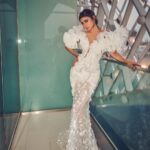 Mouni Roy Instagram - In the crucible of hardship's flame, the spirit ignites, fueled by an unwavering aim. Through the labyrinth of hustle, we navigate, chasing dreams, defying fate. And in the tapestry of life's grand design, we weave our story, where life truly shines….. Hustling err’yday 🤍 Styled by - @mohitrai with @shubhi.kumar @tarangagarwalofficial @teammrstyles Outfit - @michael5inco Shoes - @stevemaddenindia Beauty @bhavyaarora Managed by @trishilagoculdas @dcatalent 📸 @amannagoshe (happy happy birthday) 🎉 @iifa #iffa2023 Abu Dhabi, United Arab Emirates