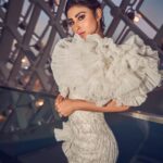 Mouni Roy Instagram - In the crucible of hardship's flame, the spirit ignites, fueled by an unwavering aim. Through the labyrinth of hustle, we navigate, chasing dreams, defying fate. And in the tapestry of life's grand design, we weave our story, where life truly shines….. Hustling err’yday 🤍 Styled by - @mohitrai with @shubhi.kumar @tarangagarwalofficial @teammrstyles Outfit - @michael5inco Shoes - @stevemaddenindia Beauty @bhavyaarora Managed by @trishilagoculdas @dcatalent 📸 @amannagoshe (happy happy birthday) 🎉 @iifa #iffa2023 Abu Dhabi, United Arab Emirates