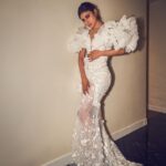 Mouni Roy Instagram - In the crucible of hardship's flame, the spirit ignites, fueled by an unwavering aim. Through the labyrinth of hustle, we navigate, chasing dreams, defying fate. And in the tapestry of life's grand design, we weave our story, where life truly shines….. Hustling err’yday 🤍 Styled by - @mohitrai with @shubhi.kumar @tarangagarwalofficial @teammrstyles Outfit - @michael5inco Shoes - @stevemaddenindia Beauty @bhavyaarora Managed by @trishilagoculdas @dcatalent 📸 @amannagoshe (happy happy birthday) 🎉 @iifa #iffa2023 Abu Dhabi, United Arab Emirates
