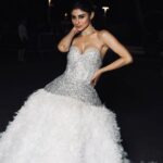 Mouni Roy Instagram - Belle of the ball 😌 merci beaucoup x Dressed in:@atelierzuhra x Jewellery :@boucheron x Heels:@giuseppezanotti Styled by : @manekaharisinghani with @chintan_shah08 HMU : gpkritikos Creative Production- @fetch_india @pankhurifetch Photographer - @wilsonballarin Videographer - @shakeelbinafzal Lenskart - @sashakeneivonuo @anupamtripathi__ Cannes, France