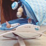 Mridula Vijay Instagram - Thank you so much @infantso.baby for this Rocker and Bedding set. It is really very useful for Dwani baby . ROCKER •Adjustable recline •Detachable canopy •Overhead toy bar • Soothing vibrations and melodies BEDDING SET • The fabric of this bedding set is made of 100% premium super soft cotton. • The set is free from harmful chemicals, which means no rashes and allergies. • All items are machine washable for efficient cleaning. • The set consists of a mattress, bedsheet, duvet cover, 2 bed protectors, a pillow, a u-pillow and 2 bolsters. • The cute gingham design of these bedding sets are unisex