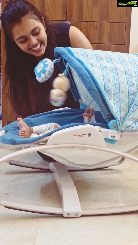 Mridula Vijay Instagram - Thank you so much @infantso.baby for this Rocker and Bedding set. It is really very useful for Dwani baby . ROCKER •Adjustable recline •Detachable canopy •Overhead toy bar • Soothing vibrations and melodies BEDDING SET • The fabric of this bedding set is made of 100% premium super soft cotton. • The set is free from harmful chemicals, which means no rashes and allergies. • All items are machine washable for efficient cleaning. • The set consists of a mattress, bedsheet, duvet cover, 2 bed protectors, a pillow, a u-pillow and 2 bolsters. • The cute gingham design of these bedding sets are unisex