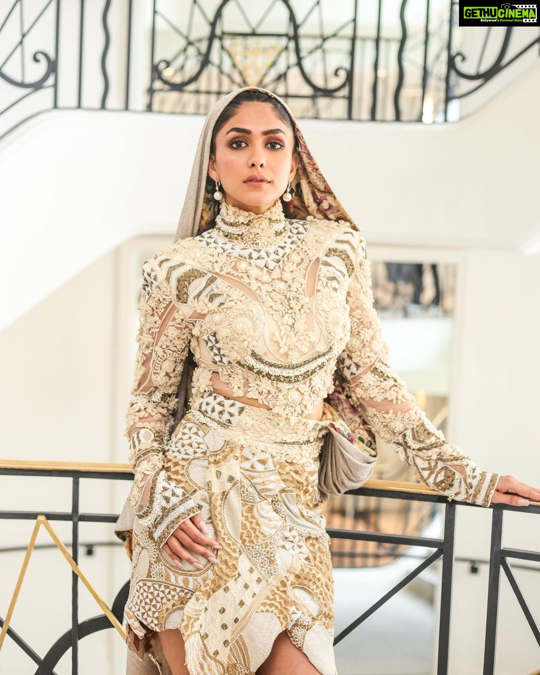 Mrunal Thakur Instagram - HOODED GLAMOUR COUTURE HMU - @shraddhamishra8 @suchika__ Styling - @rahulvijay1988 assisted by @thanishqkokare Photo - @eastmancolourr Video - @amitsingh.dop @shakeelbinafzal Custom Look - @anamikakhanna.in Earrings - @diosaparis @amigos.rizwan Shoes - @louboutinworld #Cannes2023 #Collab #GreyGoose #ViveLeVoyage @greygoose @fetch_india