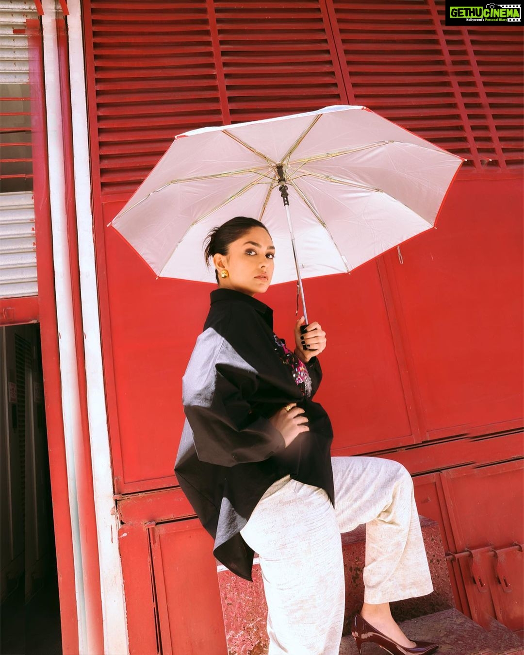 Mrunal Thakur Instagram - You can stand under my umbrella! Styled by: @rahulvijay1988 Assisted by (styling) @maitriidesaii Shirt & Pants - @saakshakinni @elevate_promotions Bodysuit- @studioverandah Earrings- @misho_designs Rings- @e3kjewelry @ascend.rohank Shoes- @louboutinworld Glam by- @missblender Hair- @deepalid10 Assisted by @vidushiparashar18 Photos- @samrat.02