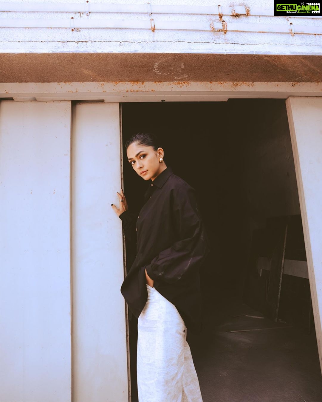 Mrunal Thakur Instagram - You can stand under my umbrella! Styled by: @rahulvijay1988 Assisted by (styling) @maitriidesaii Shirt & Pants - @saakshakinni @elevate_promotions Bodysuit- @studioverandah Earrings- @misho_designs Rings- @e3kjewelry @ascend.rohank Shoes- @louboutinworld Glam by- @missblender Hair- @deepalid10 Assisted by @vidushiparashar18 Photos- @samrat.02
