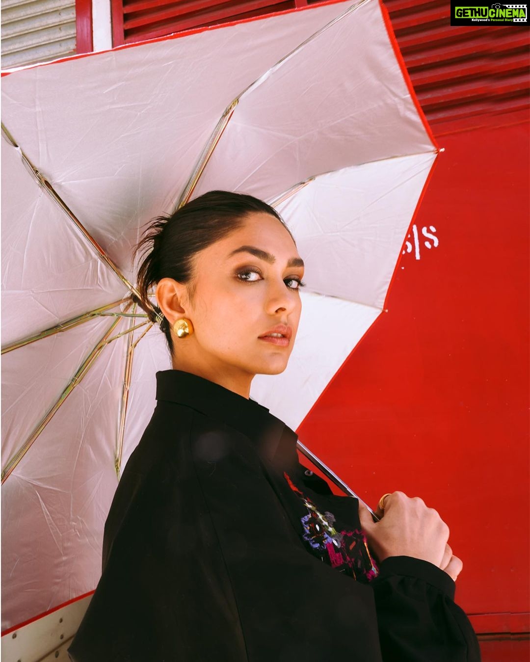 Mrunal Thakur Instagram - You can stand under my umbrella! Styled by: @rahulvijay1988 Assisted by (styling) @maitriidesaii Shirt & Pants - @saakshakinni @elevate_promotions Bodysuit- @studioverandah Earrings- @misho_designs Rings- @e3kjewelry @ascend.rohank Shoes- @louboutinworld Glam by- @missblender Hair- @deepalid10 Assisted by @vidushiparashar18 Photos- @samrat.02
