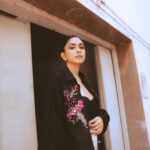 Mrunal Thakur Instagram - You can stand under my umbrella! Styled by: @rahulvijay1988 Assisted by (styling) @maitriidesaii Shirt & Pants - @saakshakinni @elevate_promotions Bodysuit- @studioverandah Earrings- @misho_designs Rings- @e3kjewelry @ascend.rohank Shoes- @louboutinworld Glam by- @missblender Hair- @deepalid10 Assisted by @vidushiparashar18 Photos- @samrat.02