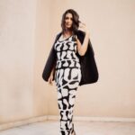 Mrunal Thakur Instagram - 🖤🤍 Styled by: @rahulvijay1988 Assisted by (styling) @maitriidesaii Dress @lovebirds.studio Jewellery @e3kjewelry @ascend.rohank Shoes @louboutinworld Makeup by @missblender Hair by @deepalid10 Assisted by @vidushiparashar18 Photos: @_psudo_ #gumraahpromotions