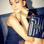 Mrunal Thakur Instagram - Let’s go? 🐈‍⬛💫 Outfit @shehlaakhan Jewellery @outhousejewellry Bag @jimmychoo Styled by @sheefajgilani Hair: @deepalid10 Make up: @missblender Assisted by @kashishsinhaaa Style coordinator @niyoshi.jain @tanyasadwhiny Photos: @leroifoto