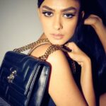 Mrunal Thakur Instagram - Let’s go? 🐈‍⬛💫 Outfit @shehlaakhan Jewellery @outhousejewellry Bag @jimmychoo Styled by @sheefajgilani Hair: @deepalid10 Make up: @missblender Assisted by @kashishsinhaaa Style coordinator @niyoshi.jain @tanyasadwhiny Photos: @leroifoto