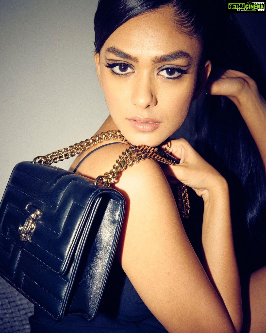Mrunal Thakur Instagram - Let’s go? 🐈⬛💫 Outfit @shehlaakhan Jewellery @outhousejewellry Bag @jimmychoo Styled by @sheefajgilani Hair: @deepalid10 Make up: @missblender Assisted by @kashishsinhaaa Style coordinator @niyoshi.jain @tanyasadwhiny Photos: @leroifoto