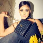 Mrunal Thakur Instagram - Let’s go? 🐈‍⬛💫 Outfit @shehlaakhan Jewellery @outhousejewellry Bag @jimmychoo Styled by @sheefajgilani Hair: @deepalid10 Make up: @missblender Assisted by @kashishsinhaaa Style coordinator @niyoshi.jain @tanyasadwhiny Photos: @leroifoto