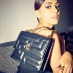 Mrunal Thakur Instagram - Let’s go? 🐈‍⬛💫 Outfit @shehlaakhan Jewellery @outhousejewellry Bag @jimmychoo Styled by @sheefajgilani Hair: @deepalid10 Make up: @missblender Assisted by @kashishsinhaaa Style coordinator @niyoshi.jain @tanyasadwhiny Photos: @leroifoto