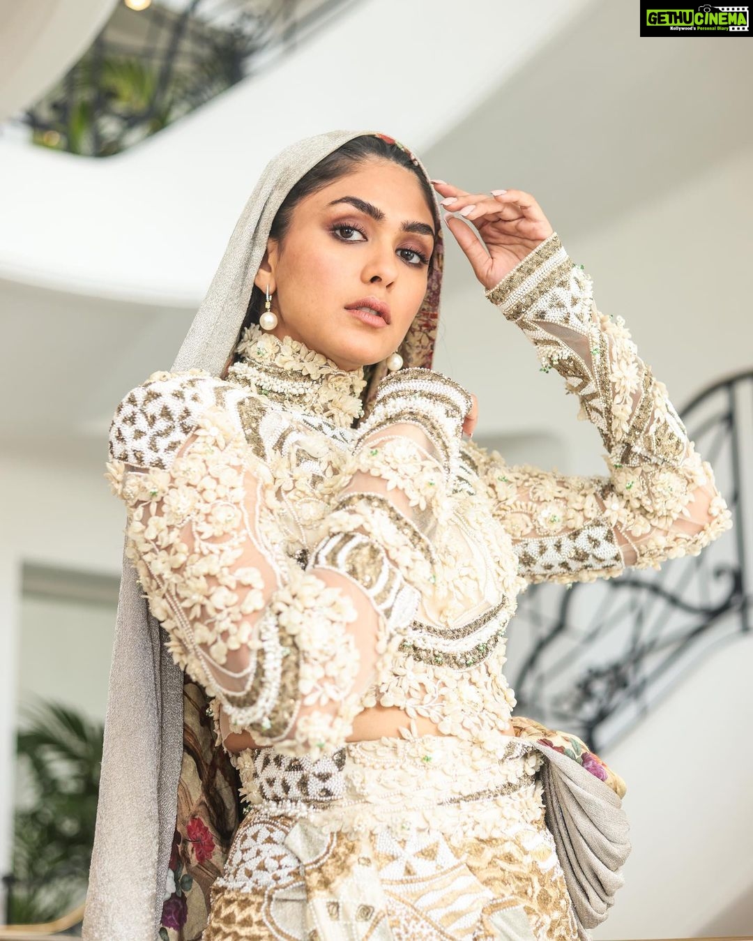 Mrunal Thakur Instagram - HOODED GLAMOUR COUTURE HMU - @shraddhamishra8 @suchika__ Styling - @rahulvijay1988 assisted by @thanishqkokare Photo - @eastmancolourr Video - @amitsingh.dop @shakeelbinafzal Custom Look - @anamikakhanna.in Earrings - @diosaparis @amigos.rizwan Shoes - @louboutinworld #Cannes2023 #Collab #GreyGoose #ViveLeVoyage @greygoose @fetch_india
