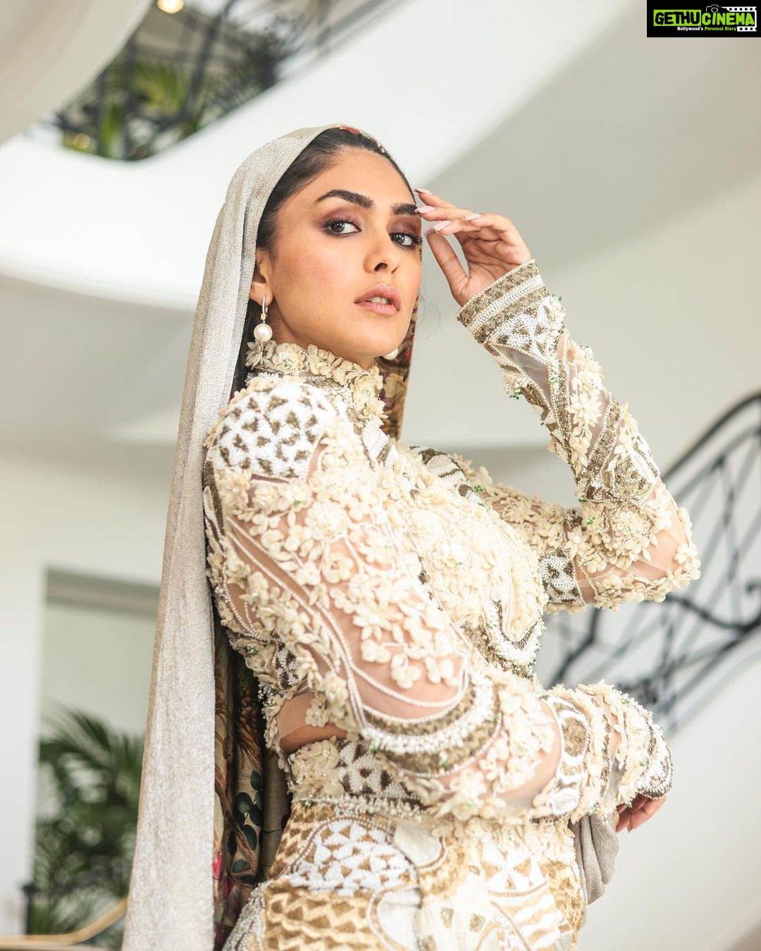 Mrunal Thakur Instagram - HOODED GLAMOUR COUTURE HMU - @shraddhamishra8 @suchika__ Styling - @rahulvijay1988 assisted by @thanishqkokare Photo - @eastmancolourr Video - @amitsingh.dop @shakeelbinafzal Custom Look - @anamikakhanna.in Earrings - @diosaparis @amigos.rizwan Shoes - @louboutinworld #Cannes2023 #Collab #GreyGoose #ViveLeVoyage @greygoose @fetch_india