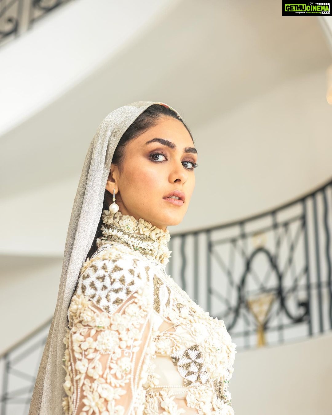 Mrunal Thakur Instagram - HOODED GLAMOUR COUTURE HMU - @shraddhamishra8 @suchika__ Styling - @rahulvijay1988 assisted by @thanishqkokare Photo - @eastmancolourr Video - @amitsingh.dop @shakeelbinafzal Custom Look - @anamikakhanna.in Earrings - @diosaparis @amigos.rizwan Shoes - @louboutinworld #Cannes2023 #Collab #GreyGoose #ViveLeVoyage @greygoose @fetch_india