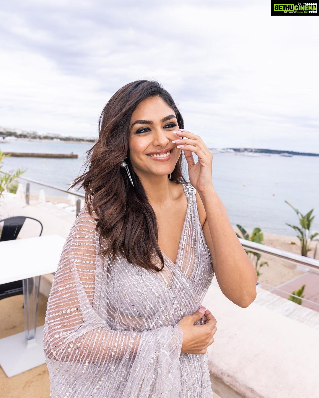 Mrunal Thakur Instagram - Thank you @falgunishanepeacockindia for this absolute stunner and for making me feel like the #DesiGirl I am HMU - @shraddhamishra8 Styling - @rahulvijay1988 Photo - @eastmancolourr Video - @amitsingh.dop @shakeelbinafzal Saree - @falgunishanepeacockindia Shoes - @jimmychoo Earrings - @outhousejewellery #Cannes2023 #Collab #GreyGoose #ViveLeVoyage @greygoose @fetch_india