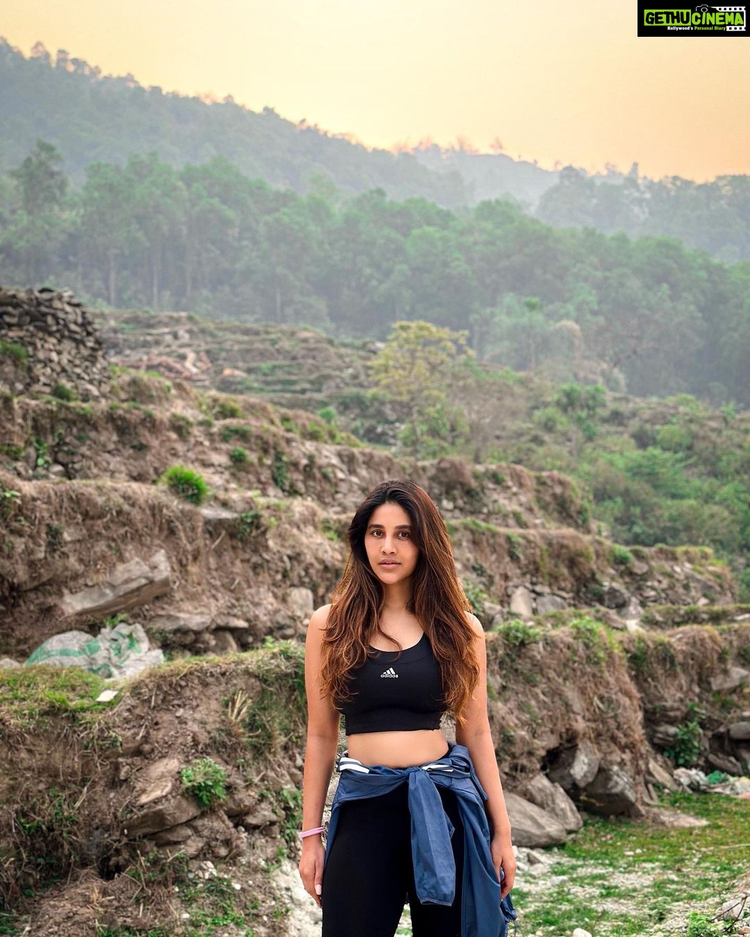 Nabha Natesh Instagram - Only and the only reason to hike up the hill in the morning is to watch The Mighty Sun arrive . To realise he doesn’t rise or set for us . We just move towards and away from him every-day pinned our feet to the ground. Thanks to The Lady Gravity, if not we are just a couple of celestials. Ok bye. : : Pc : @nahushchakravarthi, also coz of which we got detached from the group and wandered 🫣 Pokhara, Nepal