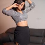 Nandita Swetha Instagram - Shine girlll🪩🪩🪩 Shot by @chidu.ln_portraits Makeup @makeupbypallavishetty Hair @__snehakumar__ . Outfit Top @urbanic_in Skirt @zara Heels @zara . #shoot #photography #makeup #glitter #hairstyle