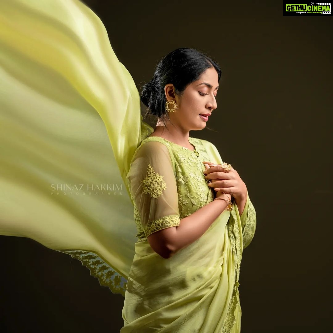 Navya Nair Instagram - "Dancing in the golden sunbeams, I'm draped in this exquisite green saree, a symphony of warmth and grace βοΈπΌ Every delicate fold, like a petal kissed by the sun, embraces my soul, weaving a radiant tale of joy and love π»β¨ Let's bask in this luminous glow together, my beautiful Insta-fam, and spread the light that shines within us all ππ #SareeLove #EternalSummer #PoetryInMotion #Evergreen Styled @rn.rakhi MUA @makeupby_nami_ Wearing @zuleiha_by_shehazeen Jewellery @adorebypriyanka . Styling assistants @susaaani_ @sandra_resmi Photography @bigstoriesweddingcompany