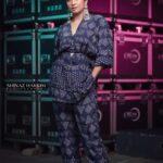 Navya Nair Instagram - "Wrapped in the magic of blue, where dreams and reality intertwine, I stand amidst the reels that hold stories untold. May hope be our constant guide, leading us to worlds yet undiscovered. 🌟🎞️ #CinematicDreams #BlueInspiration" Styled by @rn.rakhi @amkaindia Jewellery @adorebypriyanka . MUA @makeupby_nami_ Styling assistants @susaaani_ @sandra_resmi Photography @bigstoriesweddingcompany