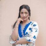 Navya Nair Instagram - In blue and white, I find delight, A soul dancing in the spotlight. Stories told, emotions unfold, A canvas of dreams, my heart behold. #ActressInBlue #DelightfulAttire #ShineBright Styled @rn.rakhi MUA @makeupby_nami_ Wearing @prashantchouhandesign Jewellery @desicallyethnic Styling assistant @susaaani_ Photography @_mr_photoman_ @cameramanweddings_