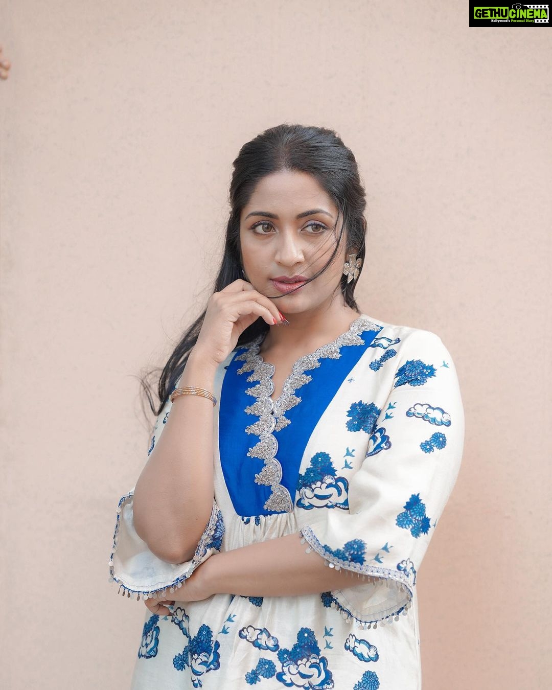 Navya Nair Instagram - In blue and white, I find delight, A soul dancing in the spotlight. Stories told, emotions unfold, A canvas of dreams, my heart behold. #ActressInBlue #DelightfulAttire #ShineBright Styled @rn.rakhi MUA @makeupby_nami_ Wearing @prashantchouhandesign Jewellery @desicallyethnic Styling assistant @susaaani_ Photography @_mr_photoman_ @cameramanweddings_