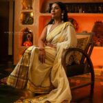 Navya Nair Instagram - "Adorned in this enchanting traditional saree with golden glowing tapestry, I find myself immersed in divine elegance ✨🌟 A sublime fusion of heritage and grace, this ethereal attire weaves a tale of celestial beauty, illuminating my very soul 💫🥰 Let's celebrate our radiant roots and light up the world together, my lovely Insta-fam 🌍💛 #SareeLove #GoldenGlow #DivineElegance #CherishingTraditions" Makeup @makeupby_nami_ Styling @sabarinathk_ Wearing @kasavukada_1985 Photography @nithin_c_nandakumar