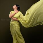 Navya Nair Instagram - "Dancing in the golden sunbeams, I'm draped in this exquisite green saree, a symphony of warmth and grace ☀️🌼 Every delicate fold, like a petal kissed by the sun, embraces my soul, weaving a radiant tale of joy and love 🌻✨ Let's bask in this luminous glow together, my beautiful Insta-fam, and spread the light that shines within us all 🌟💛 #SareeLove #EternalSummer #PoetryInMotion #Evergreen Styled @rn.rakhi MUA @makeupby_nami_ Wearing @zuleiha_by_shehazeen Jewellery @adorebypriyanka . Styling assistants @susaaani_ @sandra_resmi Photography @bigstoriesweddingcompany