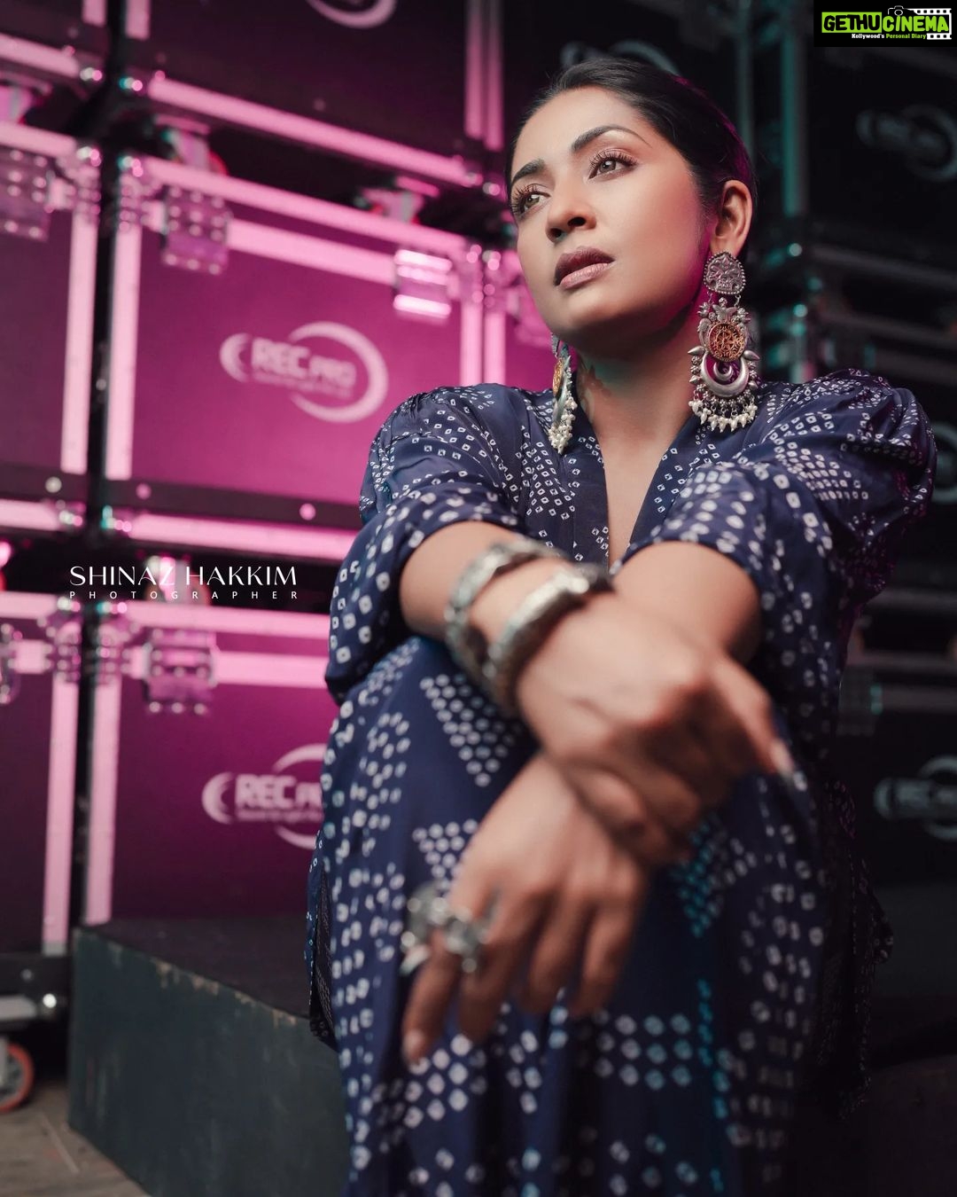 Navya Nair Instagram - "Wrapped in the magic of blue, where dreams and reality intertwine, I stand amidst the reels that hold stories untold. May hope be our constant guide, leading us to worlds yet undiscovered. ๐๐๏ธ #CinematicDreams #BlueInspiration" Styled by @rn.rakhi @amkaindia Jewellery @adorebypriyanka . MUA @makeupby_nami_ Styling assistants @susaaani_ @sandra_resmi Photography @bigstoriesweddingcompany