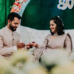 Neetha Ashok Instagram - Traditions are beautiful. Loved the very traditional way of sitting down and exchanging the ring ❤️ All though we had our own problems with sitting down 😂😂 🙃 Me: my ankles are sore 365 days 😂😂 Him: his pants were too tight 😂🤭 Audience complaint: they were able to see only the backs/bottoms of the photographers and friends who came forward to capture this moment 😂😂 Pc @pixel_stream Accessories @beadedtreasuresjewelry Blouse @rishi_designs11 Mua @shefali_ballal #traditions #engagement #rituals #sealedforlife #MestaNee #rings #laughter #bridetobe #groomtobe #candid #pixelstream #usmoments❤️ Kota, Kundapura