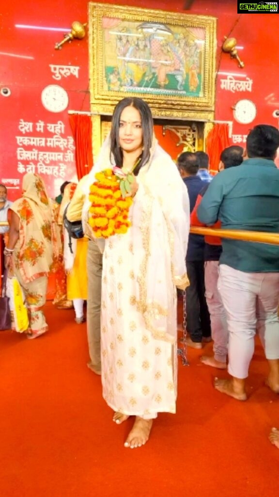 Neetu Chandra Instagram - Always connected to my roots, expressing gratitude at Mahavir Mandir in Patna, a sacred place that holds a special place in my heart since childhood. Thanking Lord Hanuman for the blessings that have made me who I am today. P.s. The besan laddo still tastes the same :)