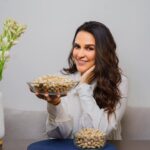 Neha Dhupia Instagram - Here is a great snack suggestion - American pistachios! @americanpistachios.india I recently came to know about a study conducted by Cornell University, that pistachios are loaded with antioxidants. In fact antioxidants in pistachios rivals the antioxidant properties of fruits like blueberries, cherries, pomegranates etc. Isn’t this amazing! In addition to being high in antioxidants pistachios are also a complete protein. They have has all the 9 essential amino acids that our body needs. Easy to store they don’t need to be cooked, just crack, pop and enjoy. American pistachios are easily available in India now. Buy them with any dry fruit retailers or any major e-commerce platform. Just search for “California pistachios” and choose from the many brands that sell them in India. #Californiapistachios #Pistachios #AmericanPistachiosIndia #AmericanPistachios