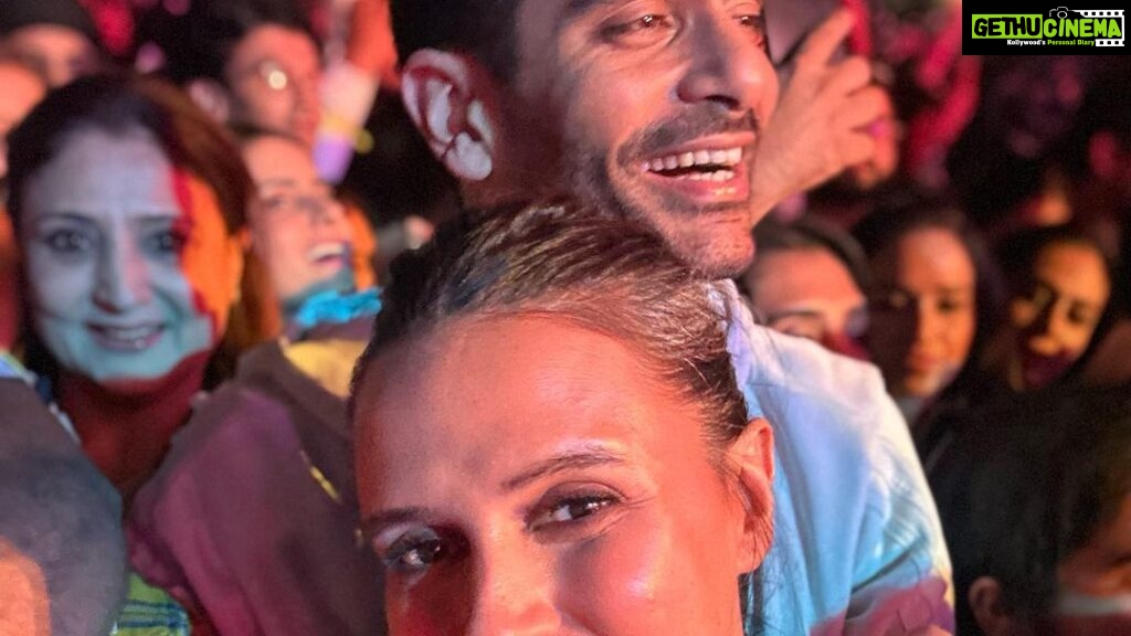 Neha Dhupia Instagram - #Doyouknow … this is the song my love @angadbedi serenaded me with … over 4 and a half years later this is us in the fan pit of a rock concert dancing to the same tunes and loving every bit of it … #datenight done right @diljitdosanjh thank you for being a part of our love story #dosanjawala ♥️🕺🏿 Jio World Garden