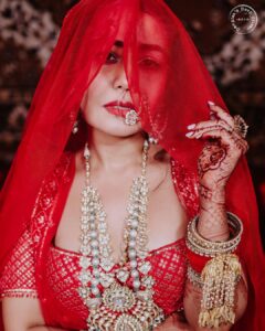 Neha Kakkar Instagram - @rohanpreetsingh ‘s Bride! ♥️♥️😇 

Photography @deepikasdeepclicks 
Wearing @falgunishanepeacockindia
@falgunipeacock @shanepeacock
Jewellery by @archanaaggarwalofficial 
Nath by @merialmariofficial 
Makeup by @vibhagusain
Hair by @deepalid10
Chooda & Kaleera by @omsons_bridal_store bridal_studio 

#NehuPreet #NehuDaVyah 
#falgunishanepeacockindia  #falgunipeacock #shanepeacock