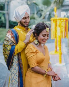 Neha Kakkar Instagram - #NehuPreet Ki Haldi Ceremony! ♥️💛🙏🏼😇 @rohanpreetsingh ♥️😇

Our Outfits : @shilpiahujaofficial 
Jewellery :  @indiatrend 
@justpeachyindia 
Styled By : @ritzsony @styledose1 
Rohu’s Footwears: @italianshoesco 
Make up: @vibhagusain 
Hair: @deepalid10 
Photography: @deepikasdeepclicks 
Mehendi: @rajumehandiwala6 
 
#NehuDaVyah