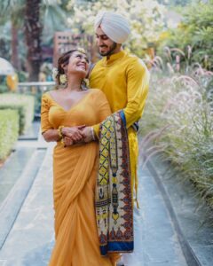 Neha Kakkar Instagram - #NehuPreet Ki Haldi Ceremony! ♥️💛🙏🏼😇 @rohanpreetsingh ♥️😇

Our Outfits : @shilpiahujaofficial 
Jewellery :  @indiatrend 
@justpeachyindia 
Styled By : @ritzsony @styledose1 
Rohu’s Footwears: @italianshoesco 
Make up: @vibhagusain 
Hair: @deepalid10 
Photography: @deepikasdeepclicks 
Mehendi: @rajumehandiwala6 
 
#NehuDaVyah