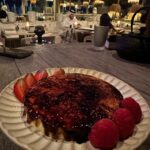 Neha Sharma Instagram - A whole lot of food, moonlight and me 🤍 Dubai