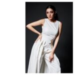 Neha Shetty Instagram - Whites and it’s shadows ! White jumpsuit @notebook.official Accessories @azgaofficial Styled by @jukalker Makeup @sadhnasingh1 Hair @koduruamarnath 📸 @venurasuri
