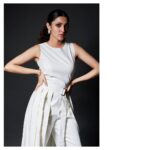 Neha Shetty Instagram - Whites and it’s shadows ! White jumpsuit @notebook.official Accessories @azgaofficial Styled by @jukalker Makeup @sadhnasingh1 Hair @koduruamarnath 📸 @venurasuri